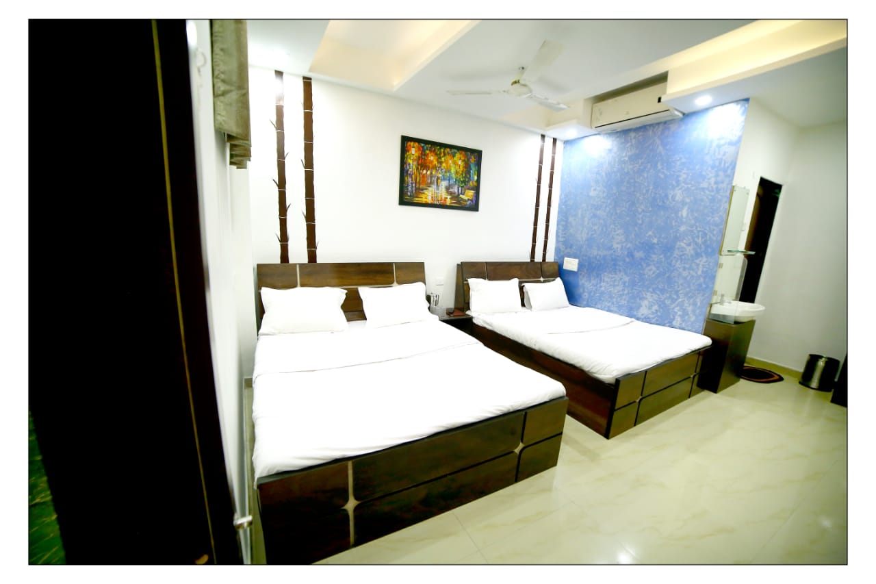 1 x Deluxe Four Bed AC Room